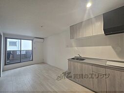 JR片町線(学研都市線) 長尾駅 徒歩12分の賃貸アパート 3階1LDKのリビング/ダイニング