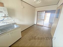 近鉄生駒線 菜畑駅 徒歩9分の賃貸アパート 1階2Kのリビング/ダイニング