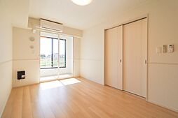 クオーレ 1階1LDKのリビング/ダイニング