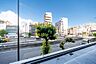 その他：【バルコニーからの眺望写真】バルコニー前面は道路なので、周囲の建物と距離があります。