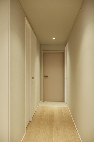 廊下のLDK側から玄関扉側を向いたカット。玄関近くにはトイレがあります。※CGイメージ