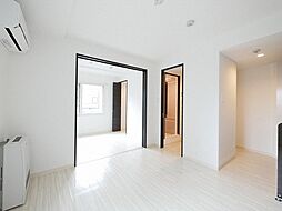 ラグジースペース南郷 2階1LDKのリビング/ダイニング