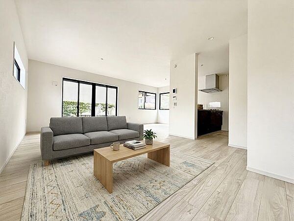 大型テレビも置ける20帖超の広々リビングは、陽当りが良く、部屋いっぱいに明るい陽光が広がります。 モデル棟 ※家具はイメージパースとなります。