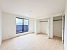 寝室：洋室 モデル棟