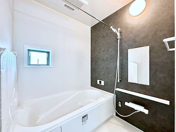 落ち着いた雰囲気でゆっくりお寛ぎいただけるバスルーム