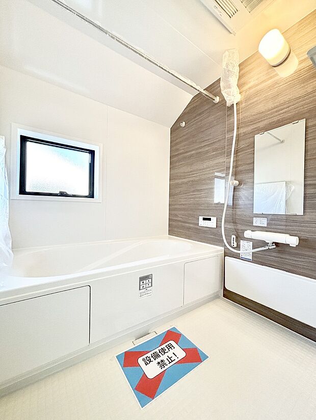 落ち着いた雰囲気でゆっくりお寛ぎいただけるバスルーム