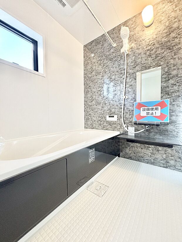 落ち着いた雰囲気でゆっくりお寛ぎいただけるバスルーム