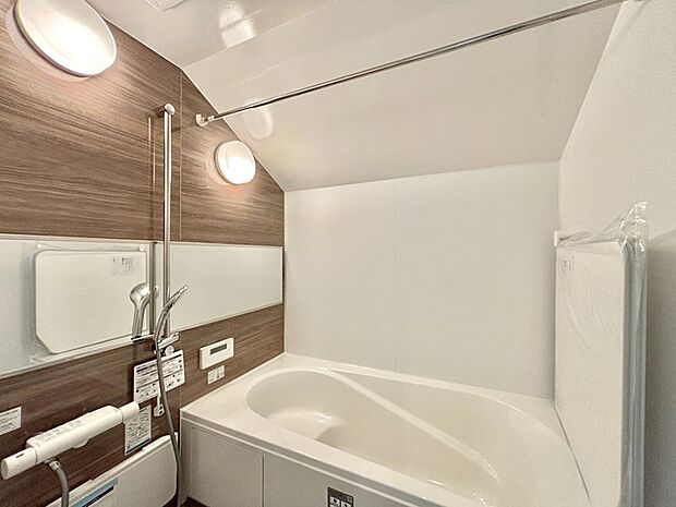 落ち着いた雰囲気でゆっくりお寛ぎいただけるバスルーム