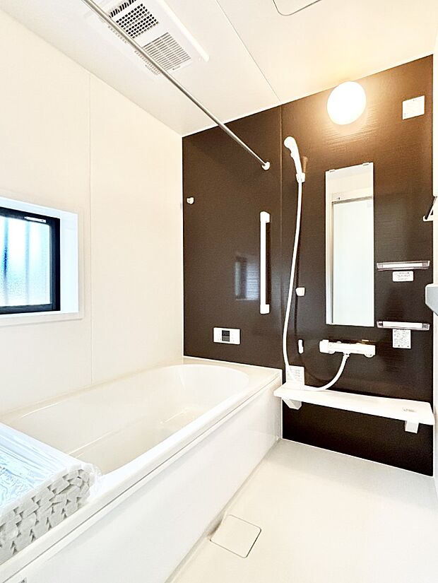 落ち着いた雰囲気でゆっくりお寛ぎいただけるバスルーム