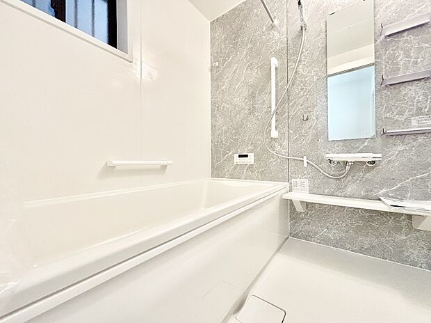 落ち着いた雰囲気でゆっくりお寛ぎいただけるバスルーム