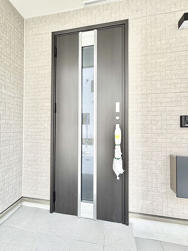 大切な家族、来客を出迎える玄関。