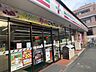 周辺：セブンイレブン川崎栗谷店 600m