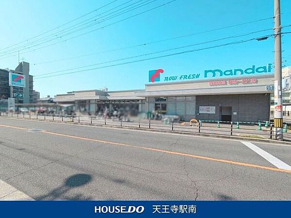 万代苅田店 370m