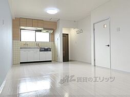 近鉄生駒線 一分駅 徒歩3分の賃貸マンション 4階2LDKのリビング/ダイニング