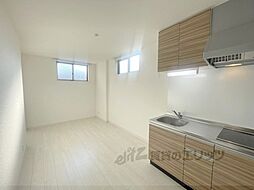 近鉄大阪線 弥刀駅 徒歩7分の賃貸アパート 3階1LDKのリビング/ダイニング