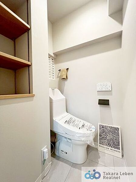 プライベート空間として機能や内装にこだわった、優しい雰囲気のあるトイレ。