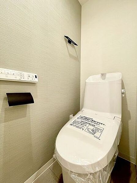 プライベート空間として機能や内装にこだわった、優しい雰囲気のあるトイレ。