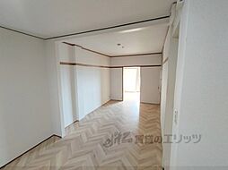 近鉄生駒線 南生駒駅 徒歩3分の賃貸マンション 3階1LDKのリビング/ダイニング