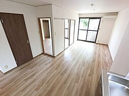 プルミエ・ラムール　Ａ 1階2LDKのリビング/ダイニング