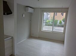 メリディアン川平　壱番館 303 3階1LDKのリビング/ダイニング