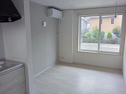 メリディアン川平　壱番館 104 1階1LDKのリビング/ダイニング