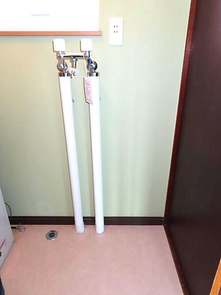 洗濯機置場になります。