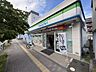 周辺：ファミリーマート日野高幡店　　徒歩7分（533m）