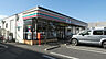周辺：セブンイレブン 綾瀬小園中央店（210m）
