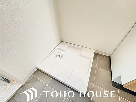 防水パン付洗濯機置場。