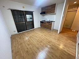 阪急宝塚本線 蛍池駅 徒歩5分の賃貸マンション 1階1DKのリビング/ダイニング