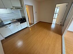 阪急宝塚本線 蛍池駅 徒歩10分の賃貸マンション 4階3LDKのリビング/ダイニング