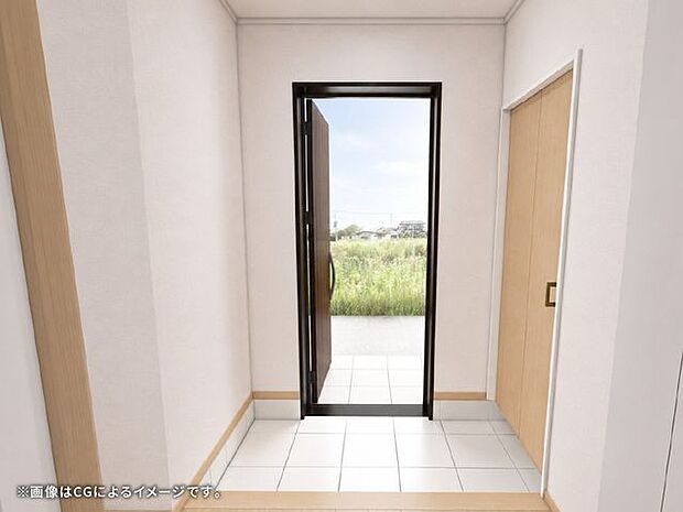 やさしい色合いでまとめた玄関は、家に入った瞬間からほっと落ち着ける心地よい空間です