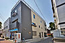 その他：大通り沿いの店舗付き住宅。