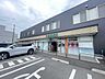 周辺：セブンイレブン 松戸常盤平駅前店 200m