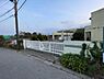 周辺：市立萱田中学校 1180m