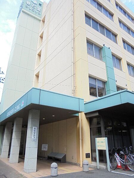 病院「医療法人巻石堂病院まで615m」