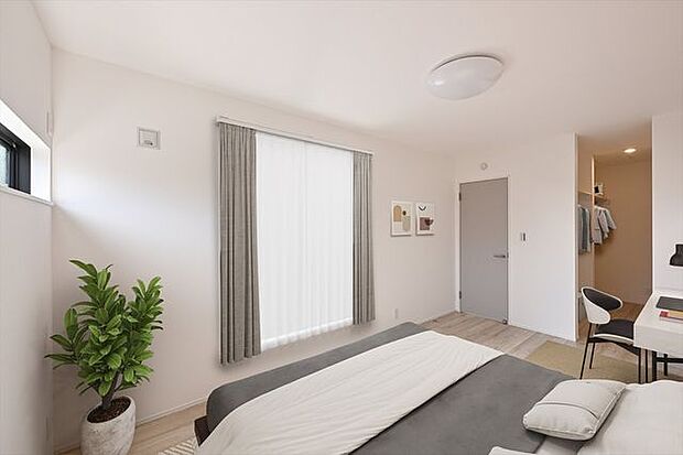 主寝室は淡いグレーのドアやニュアンスカラーの壁紙をアクセントに。グレージュカラーの床材と合わせる事で、スタイリッシュでも温かみのある空間に仕上がります。