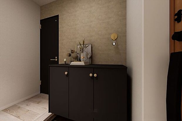 玄関は落ち着きのあるアクセントで“帰宅動線”を上質に。シューズ収納も備えて、いつでもすっきり玄関へ。