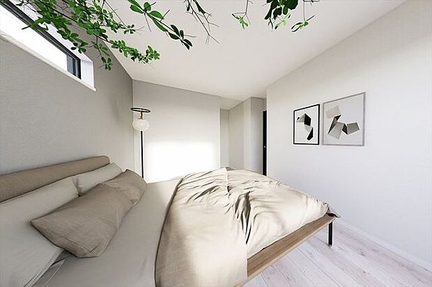 やわらかな光が入る主寝室。落ち着いたトーンでまとめ、1日の終わりをゆったり過ごせる空間に。