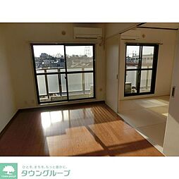 ファミール東川口 407 4階3LDKのリビング/ダイニング