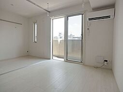 コゥジーコート 303 3階1LDKのリビング/ダイニング