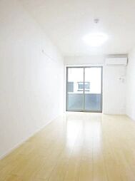 アンド・イー 106 1階1Kのリビング/ダイニング