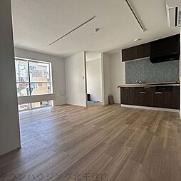 オプサス西新井 1階2LDKのリビング/ダイニング