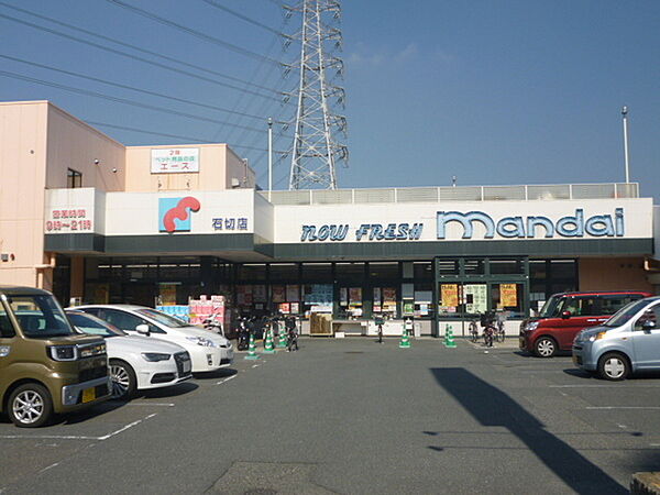 万代石切店まで458m、徒歩約9分