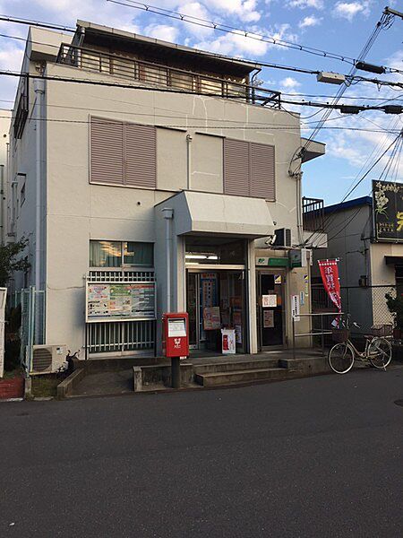大東市灰塚郵便局まで697m