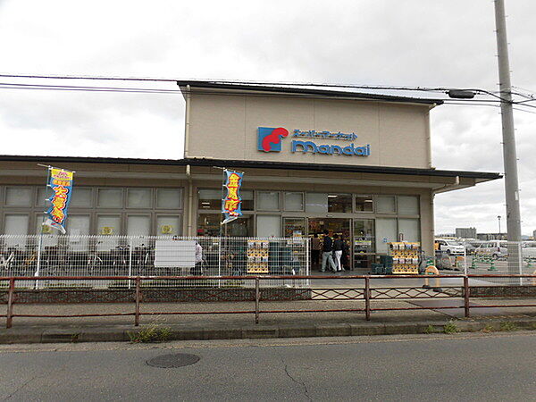 万代樫原店まで716m