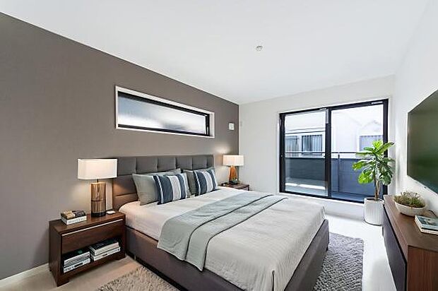 「主寝室」ダブルベットや収納ラック等、どうしても主寝室は狭くなる。広々としたお部屋は魅力です。(本画像はCGにて家具を配置しております。実際に家具はおかれておりません。)