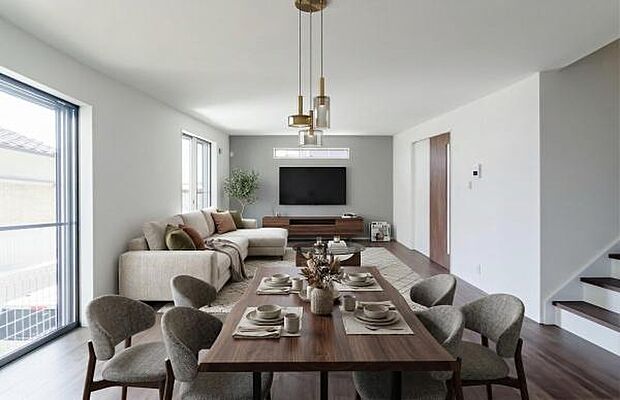 モダンで洗練されたリビング。お洒落な空間が家族の会話を自然と弾ませ、毎日の暮らしを美しくデザインします。（本画像はCGにて家具等を配置しております。実際に家具等はおかれておりません。）