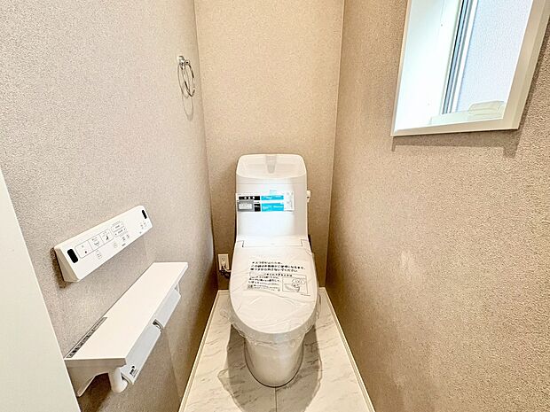クロスと床の組み合わせがお洒落なトイレスペース。