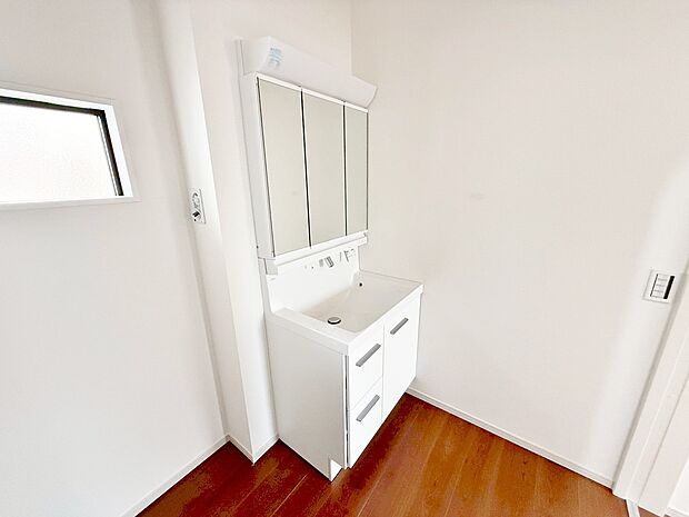 洗面所はキッチンのそばに配置し、スムーズな家事動線に。